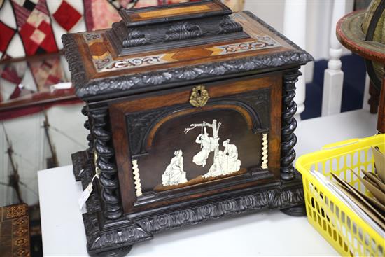 A 19th century Flemish ebony and rosewood table top cabinet, 19.5in.